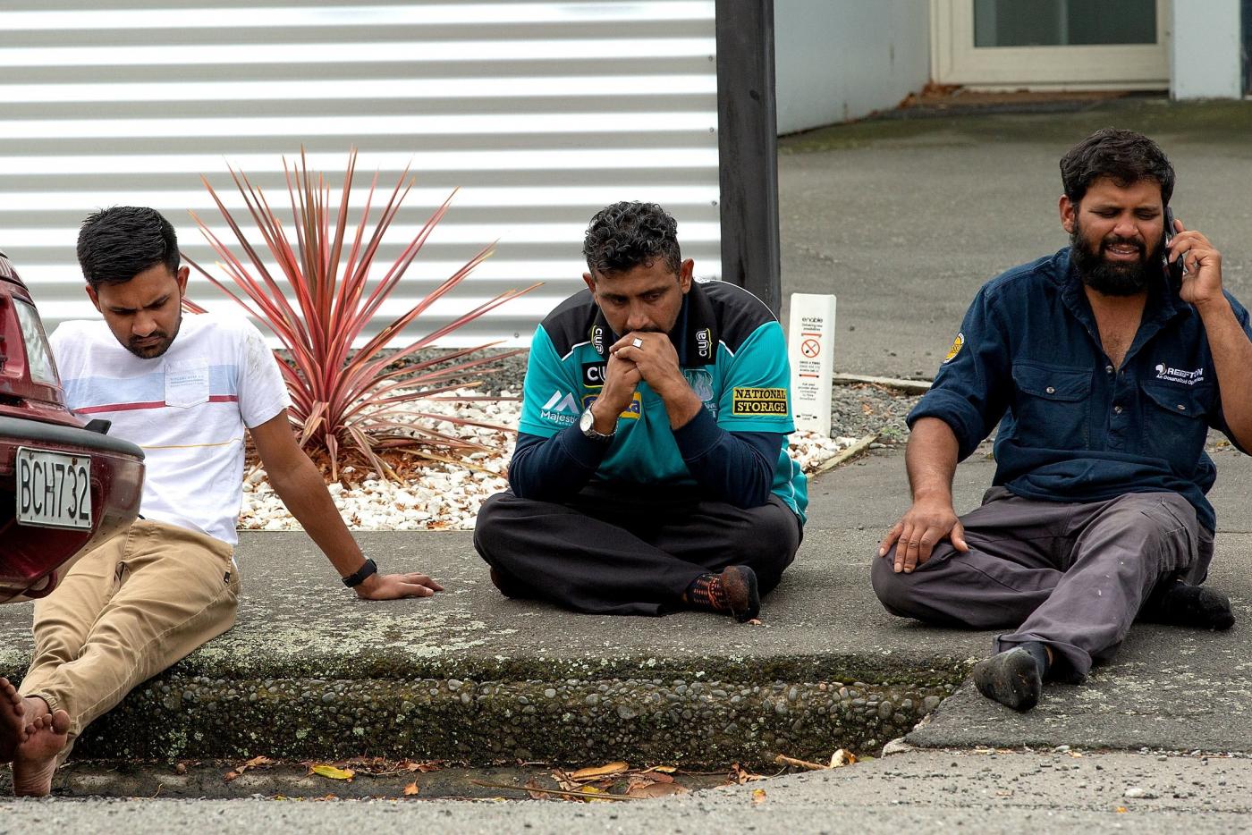 Grieving-members-of-public-aftr-shooting-Al-Noor-mosque-Christchurch-NZ