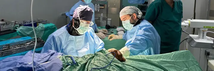 Doctors perform surgery at the European Hospital in Khan Younis